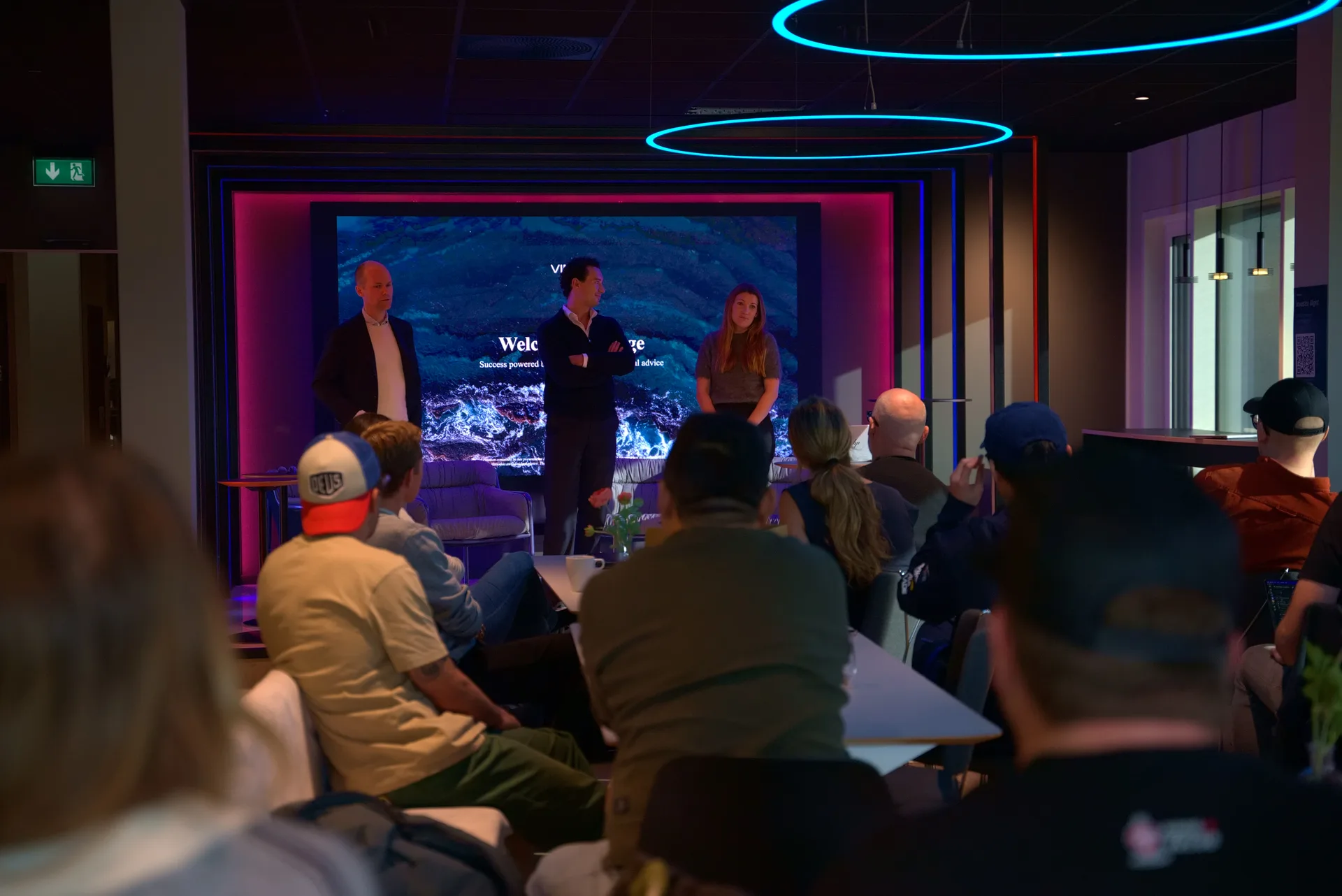 Wide view of the stage and the audience at the hub