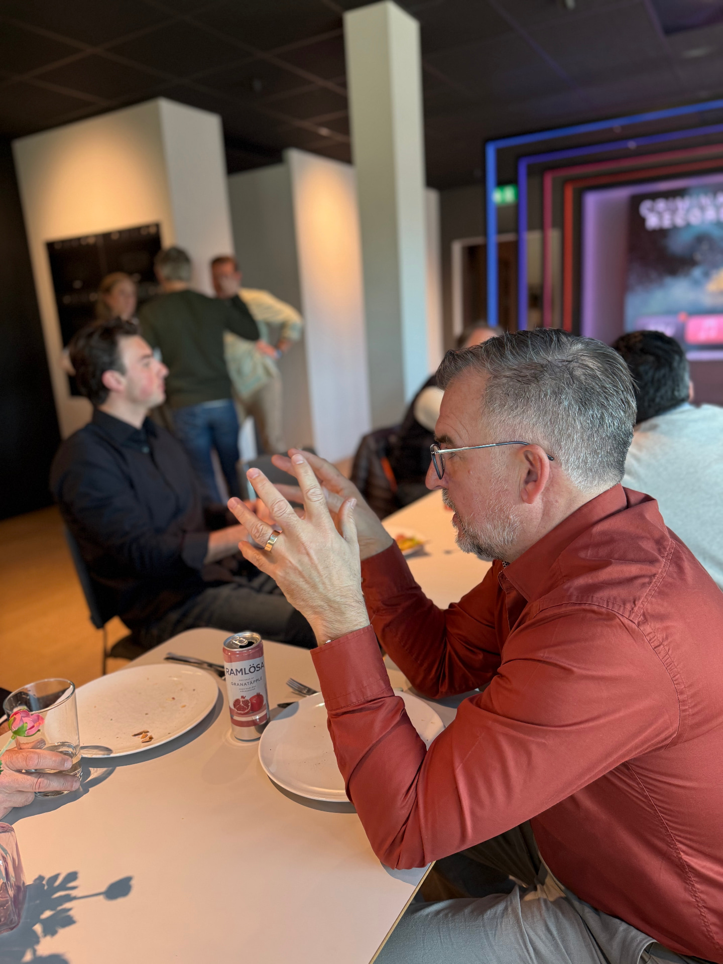 Long-table conversation between founders and investors, two hours into the afternoon